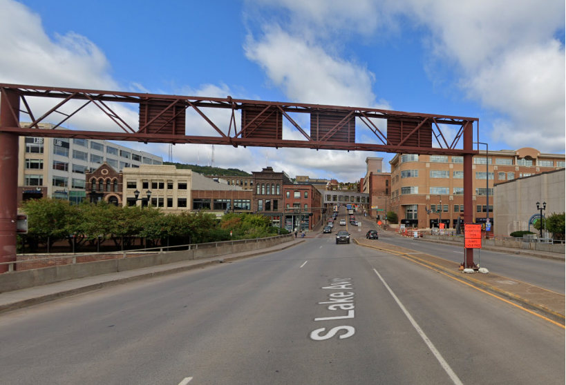 Lake Avenue bridge over Hwy 35 before construction, showing two traffic lanes and a narrow sidewalk