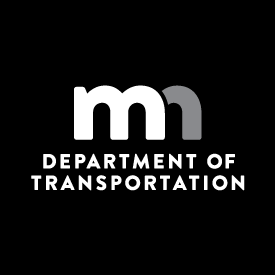 MnDOT vertical logo in reverse grayscale