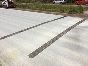 tire tracks in cement