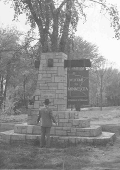 Historic Type II Entry sign, rollover image is a close-up of wooden sign